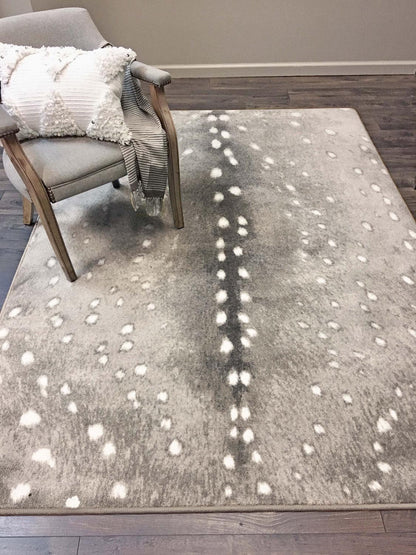 Spotted Hide Rug – Oatmeal Hint of Gray – room setting