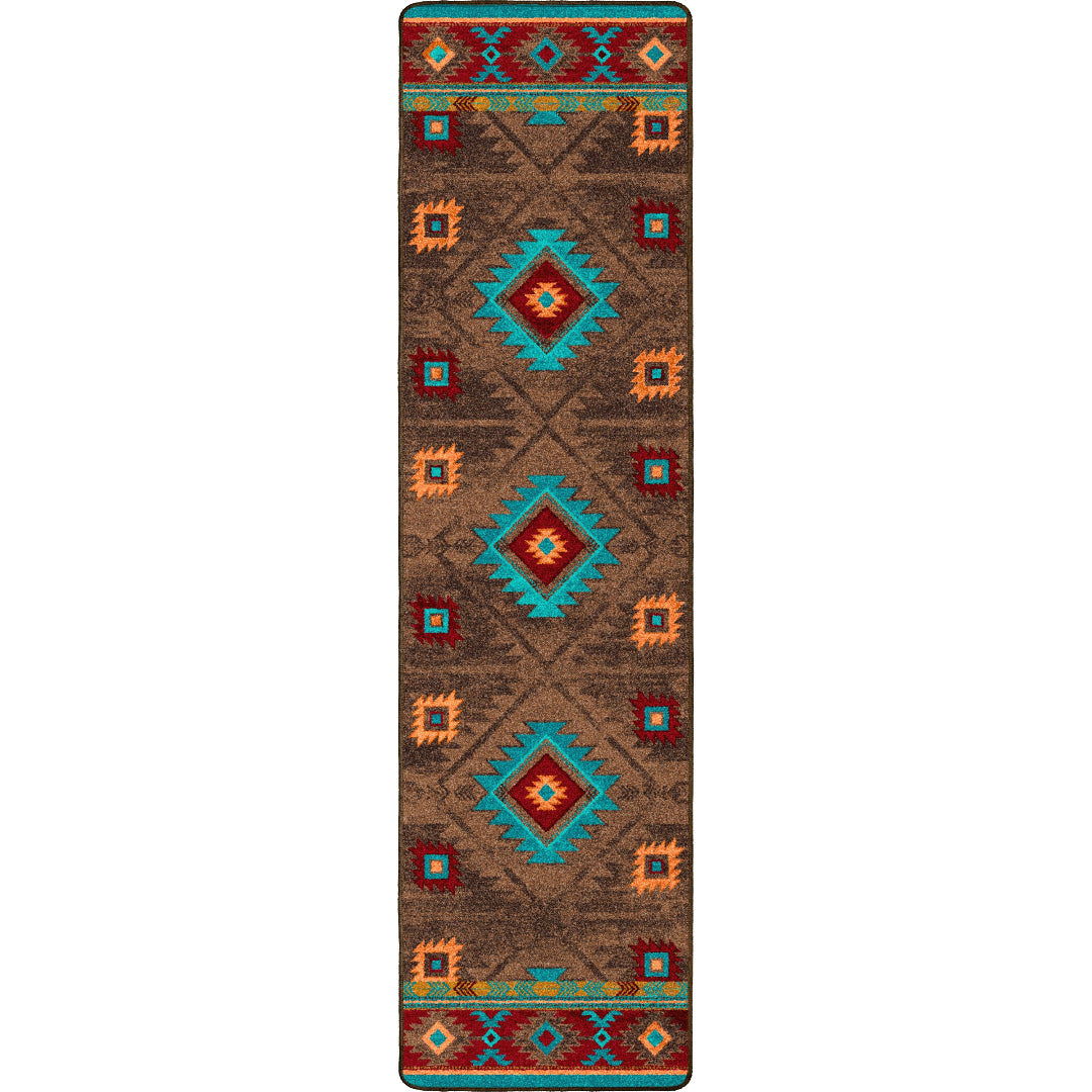 Patterned rug with geometric design on a white background